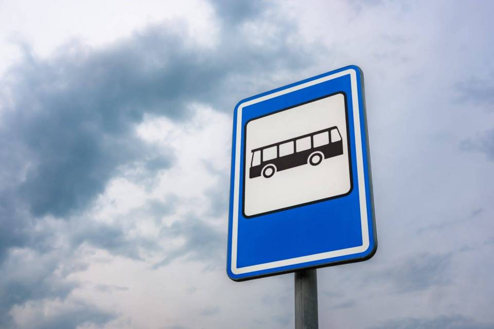 low-angle-shot-bus-stop-sign-1536x1024